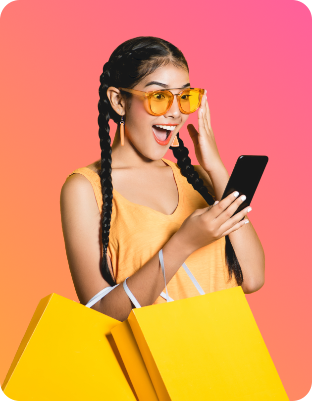 lady with sunglasses and shopping bags